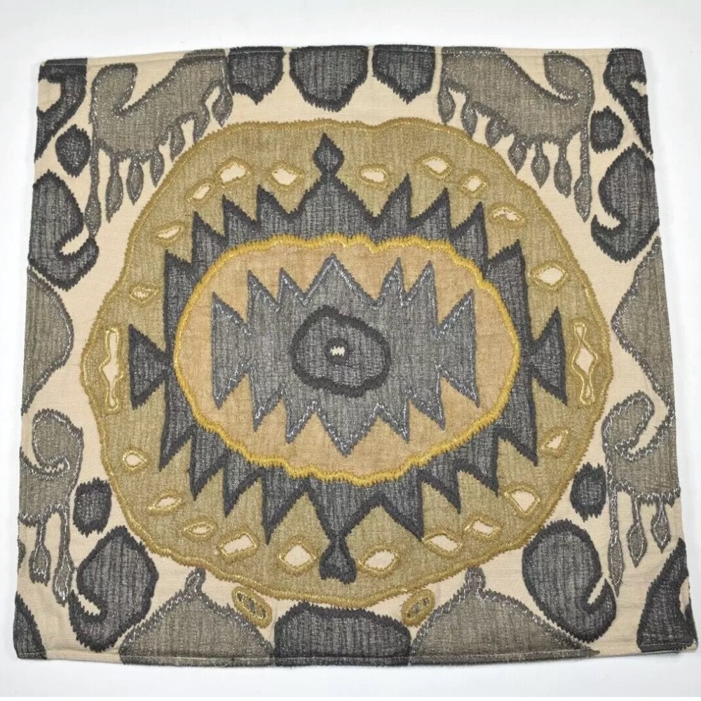 A beautiful embroidered Pottery Barn throw pillow